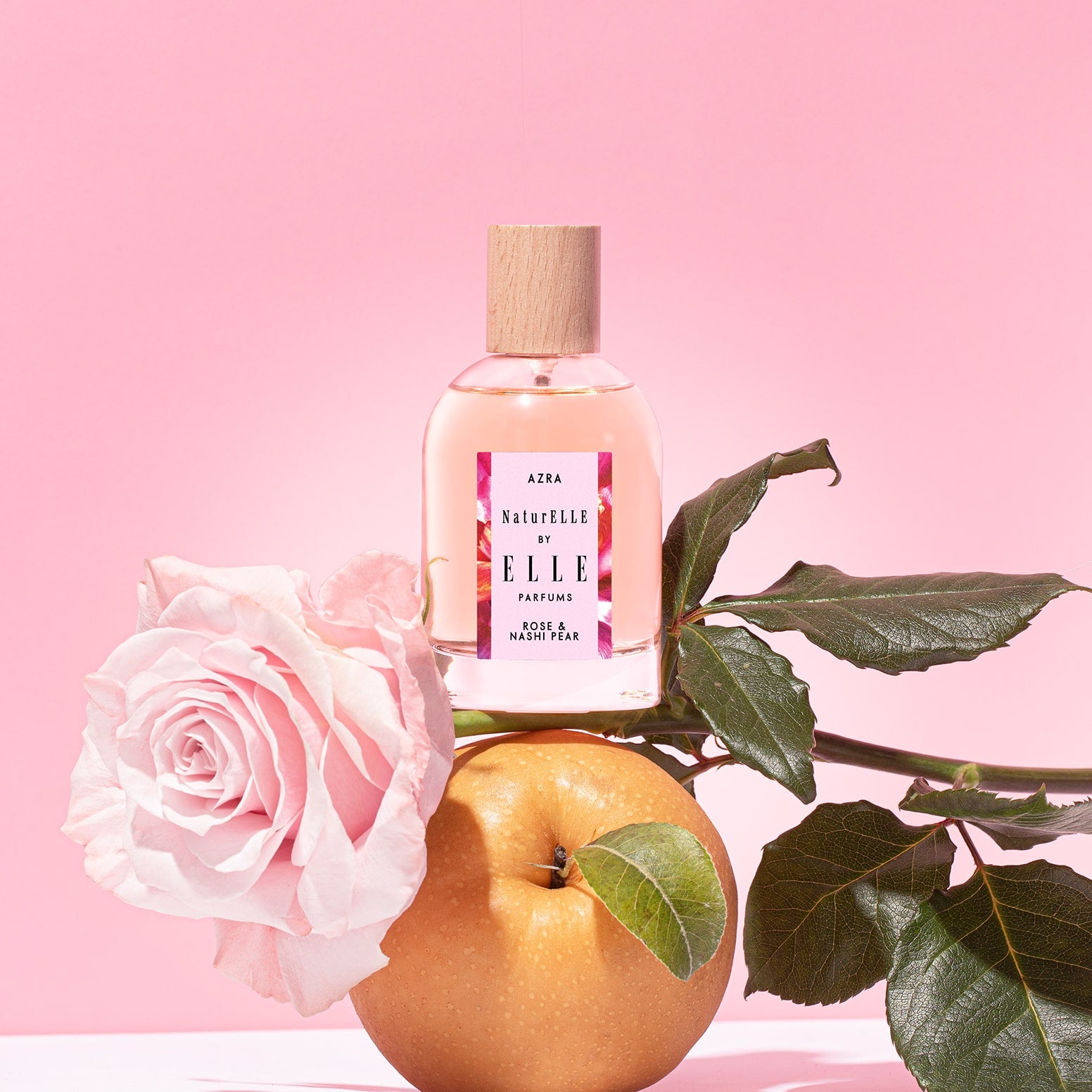 Lifestyle image of NaturELLE Azra by ELLE Parfums 100ml. The main ingredients in Azra Eau De Parfum are Rose & Nashi Pear. It's vegan, cruelty-free, naturally and ethically sourced. It's perfect for day and night.