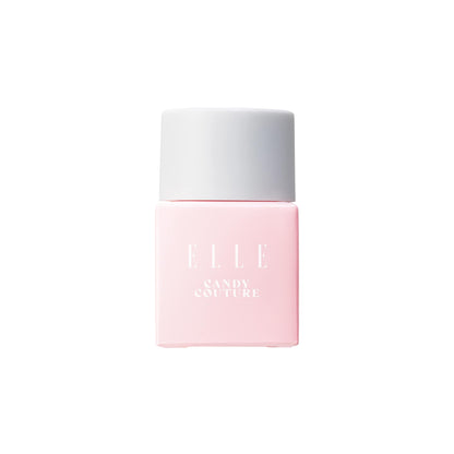 Pink perfume bottle with white cap labelled 'ELLE Candy Couture' on a white background. Pink colour is pretty and playful and creates a sweet ambience. 