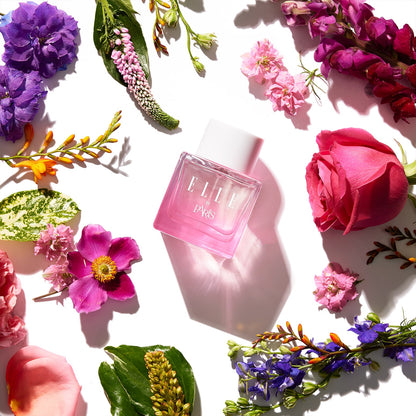 Lifestyle image of ELLE In Paris by ELLE Parfums, a fruity and floral eau de parfum inspired by the elegant Parisian lifestyle. This versatile fragrance is ideal for both day and night, cruelty-free, and suitable for vegans and vegetarians. Perfect for those seeking a chic and ethical scent.