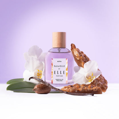 Lifestyle image of Mira by ELLE Parfums 100ml. The main ingredients in Mira Eau De Parfum are Vanilla & Praline. It's vegan, cruelty-free, naturally and ethically sourced. It's perfect for day and night.