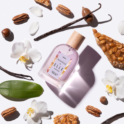 Lifestyle image of Mira by ELLE Parfums 100ml. The main ingredients in Mira Eau De Parfum are Vanilla & Praline. It's vegan, cruelty-free, naturally and ethically sourced. It's perfect for day and night.